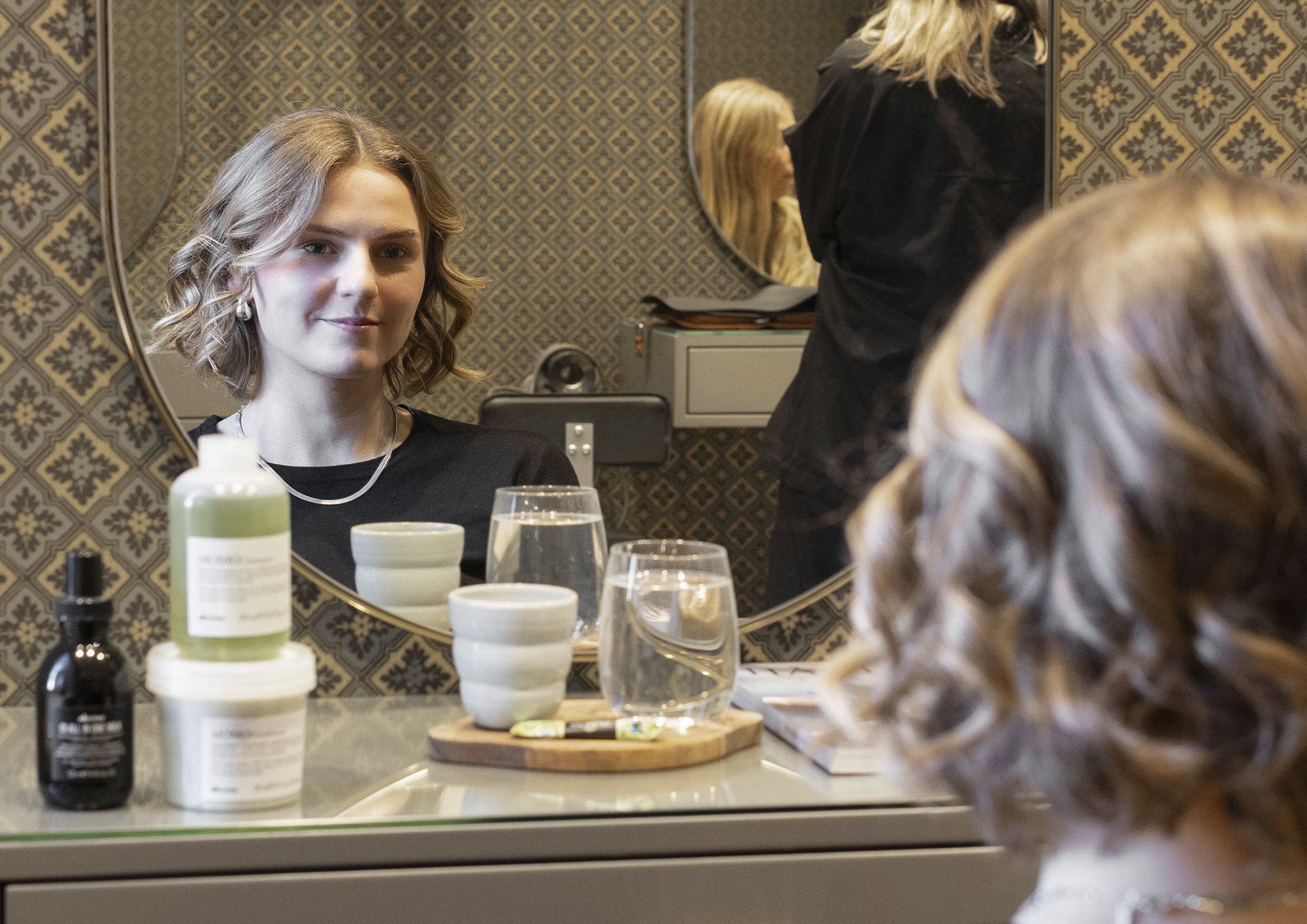 Birthe Gleerup, a hair stylist who owns and runs three salons in Aarhus. In 1990, she established the first eco-friendly hair salon in Denmark
